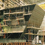 Photo of shipyard of ship builder with aluminum nomenclature nameplate